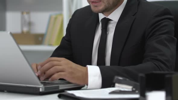 Businessman Working in Office Massaging Painful Wrist, Joint Inflammation