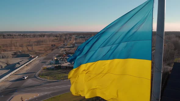 Ukrainian Flag Flutters in the Wind Moving Forward Aerial View