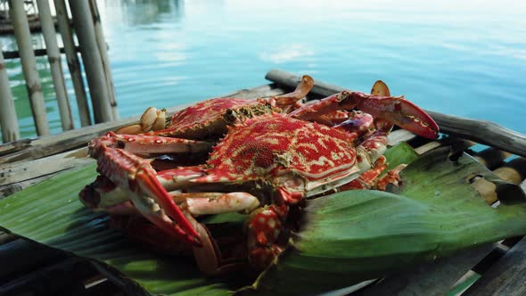 Cooked Crab on a Banana Leaf alt