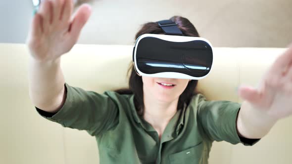 Medium Closeup Smiling Woman Having Fun Enjoying Using Modern Virtual Reality Glasses alt