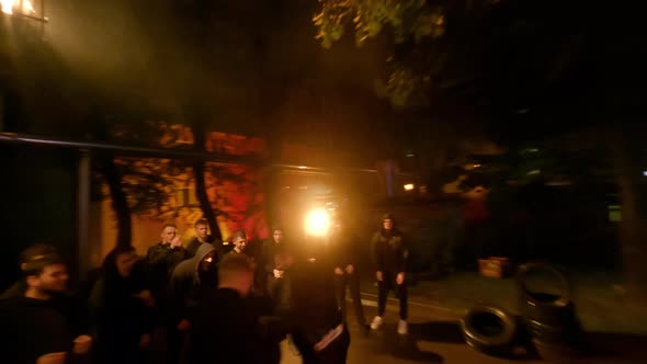 Street Fighters Trainings at Rainy Night Hood Surrounded By Barrels of Fire