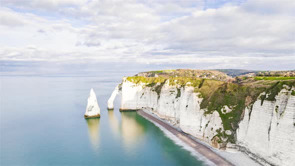 Étretat, France, Timelapse  - The iconic striking rock formations carved out of its white cliffs