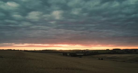 Sunset Time Lapse Over Field As Sky Darkens