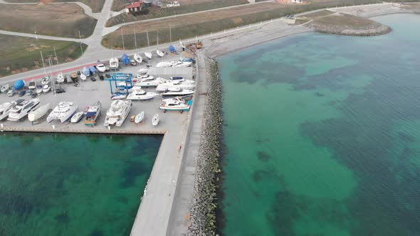 Drone Flies Away From The Yacht Club alt