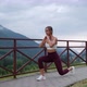 Woman Working Out in Mountain Village - VideoHive Item for Sale