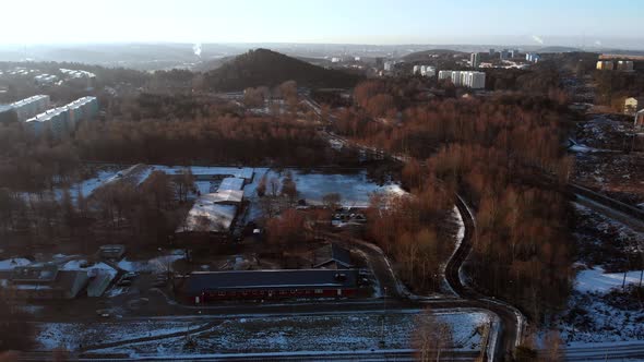 Hill and Forest in City Outskirt At Winter Suburban Area Aerial