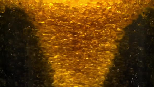 Yellow Oil Bubbles Voretex Spinning Abstract Background Looped Video