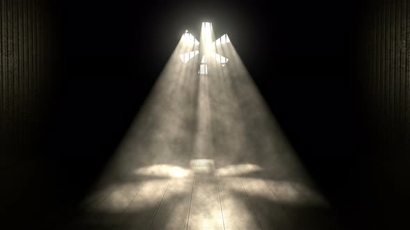 Sun Shines through Industrial Factory Fan with Sunbeams Lighting a Dark Floor alt