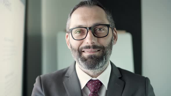 Portrait of Caucasian Bearded Middle-aged Businessman alt