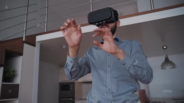 Man with Beard and 3d Virtual Glasses Is Standing By 360 View Moving.