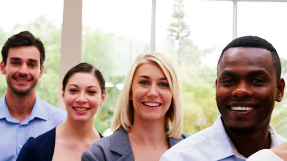 Business executives at conference center alt