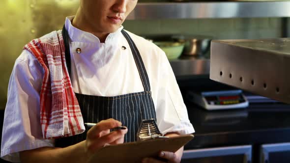 Chef working in a restaurant alt