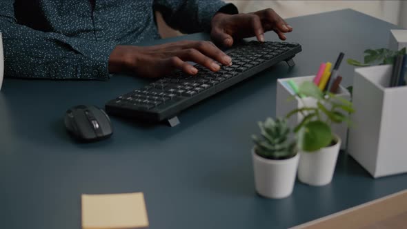 Top View of Black Man African American Hands Typing on Computer Keybord alt