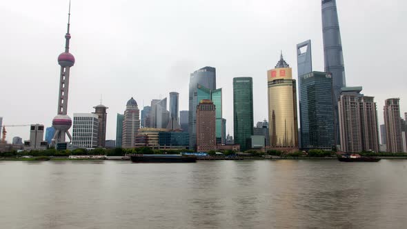 Shanghai River Cityscape Pan Up alt