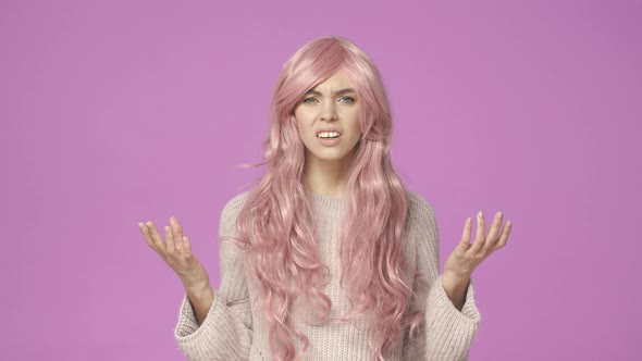 Slowmotion Questioned and Confused Bothered Young Woman in Pink Wig Squinting Look Closer Staring alt