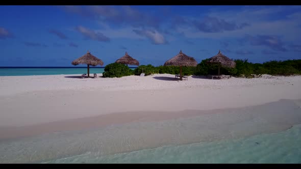 Aerial view panorama of tropical shore beach voyage by blue green ocean and white sand background of alt