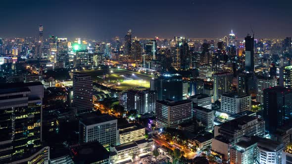 Bangkok business shopping district city center, during night, zoom out – Time Lapse