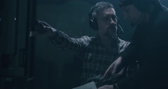 Director Discussing with a Technician alt