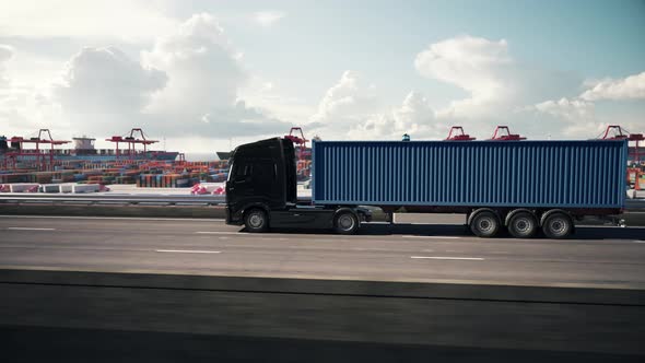 Cargo truck with container driving to the port alt