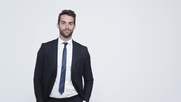 Serious Businessman Adjusting Clothes alt