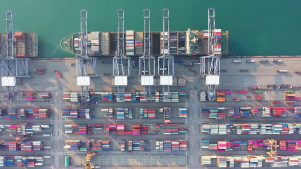 Aerial view port container terminal container ship in import export and business logistic.