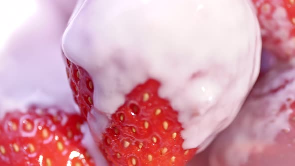 High Angle Appetizing Ripe Strawberry Covered White Yogurt or Cream Extreme Closeup alt