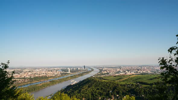 Time Lapse Wide View City of Vienna With River and Blue Sky 4K