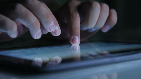 Businessman Hand Typing On A Digital Tablet Computer.