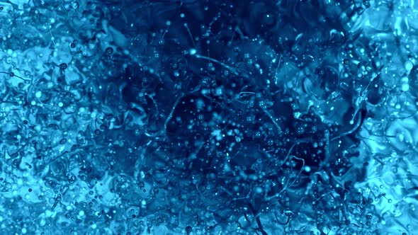 Super Slow Motion Shot of Blue Abstract Splashing Color Background at 1000 Fps Top Shot alt