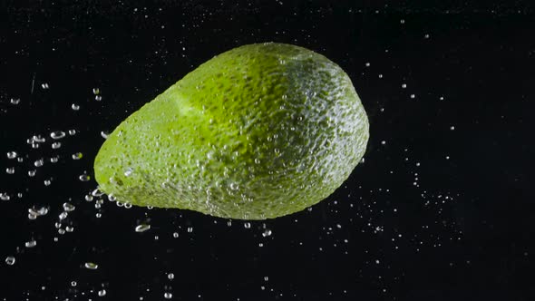 Avocado falls into water alt
