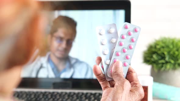 Rear View of Senior Women Online Consultation with Doctor on Digital Tablet alt