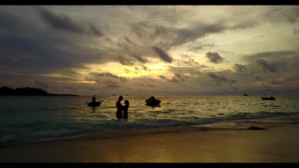 Family of two tan on paradise sea view beach break by turquoise sea and white sand background of the alt