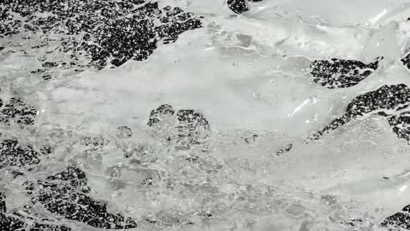 Super Slow Motion Shot of Milk Splash at 1000 Fps Isolated on Black Background. alt