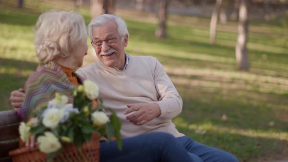 Grandparents enjoying good time with their cute little granddaughter