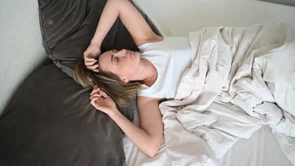Depressed Woman Tormented By Restless Sleep, She Is Exhausted and Suffering From Insomnia, Bad