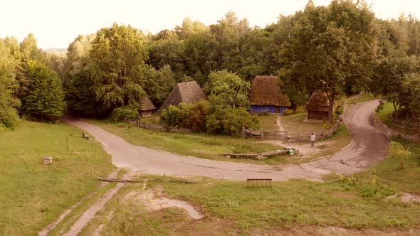 Old Small Village in a Forest alt