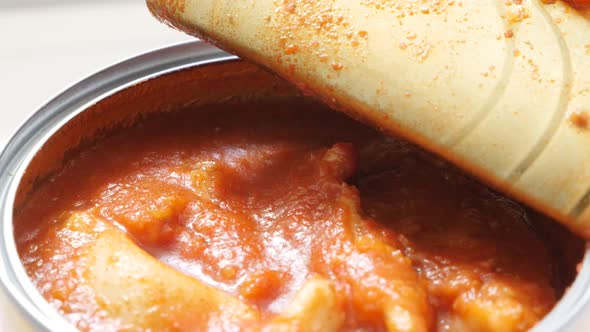 Ravioli in tomato sauce canned food slow tilt 4K 2160p 30fps UltraHD footage - Filled with meat past alt