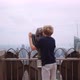 Boy Looking Through Telescope To View New York Skyscrapers - VideoHive Item for Sale