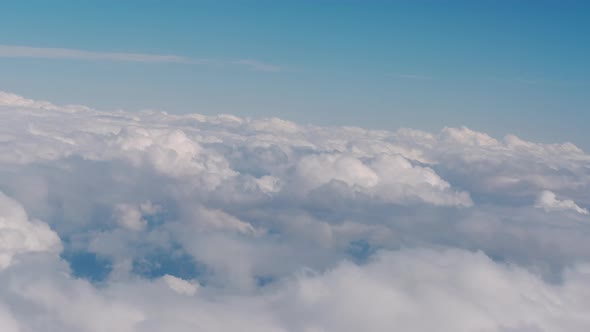 Big Clouds and Sky View From the Plane the Plane Flies High in the Sky Above the Clouds alt
