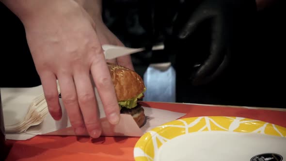 Female Street Vendor Hands Put Ketchup Sauce in Taco Outdoors alt