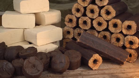 Sawdust Briquettes Those with Holes Through the Centre and Those That are Solid alt