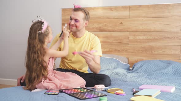 Daughter Helps Her Father Makeup for Halloween