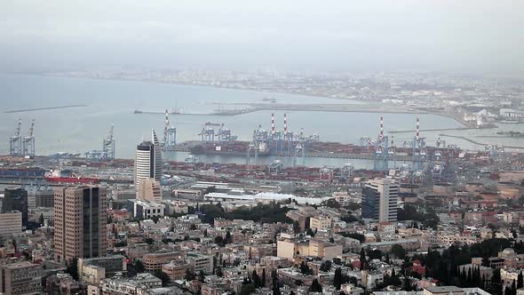 Beautiful evening view of the city of Haifa from the mountain. Large Israeli port alt