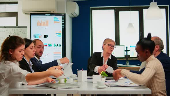 Start Up Team Meeting with Company Leader Planning Financial Strategy alt