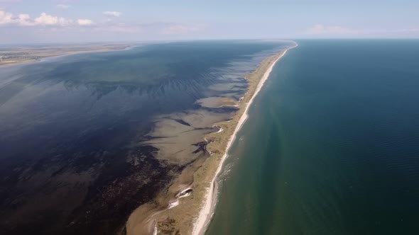 Aerial Shot of a Straight Sand Line at the Black Sea Shelf on a Sunny Day in Summer