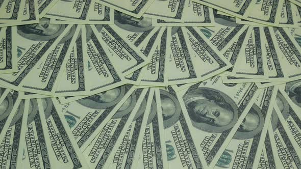 One Hundred Dollar Bills On The Table