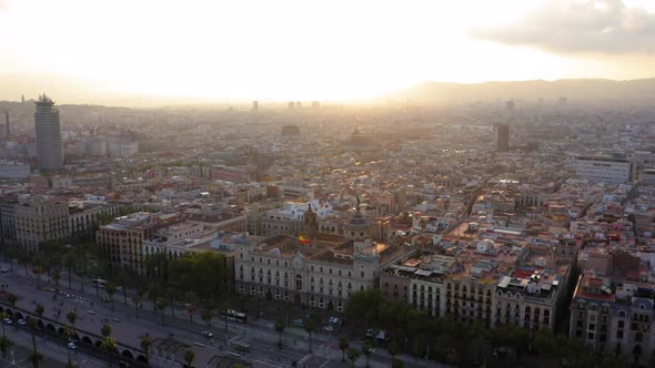 Cityscape of Barcelona at sunset with Passeig de Colom and Port Vell walkway, Spain alt