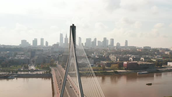 Fly Around Tall Modern Cable Stayed Swietokrzyski Bridge Over Vistula River alt