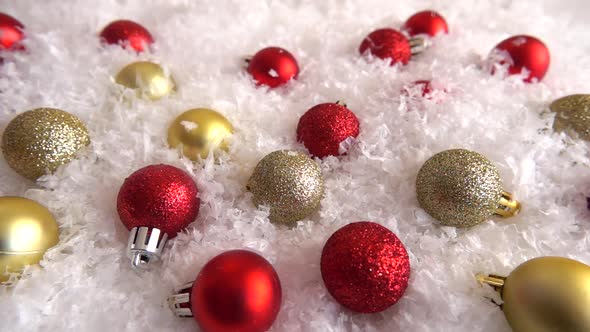 Falling snow on Christmas toys alt