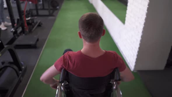 Man in a Wheelchair Working Out at the Gym